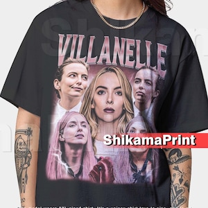 May include: Black t-shirt with the name "VILLANELLE" in pink, and a collage of images of a woman. The shirt has the text "ShikamaPrint" in white on a red banner.