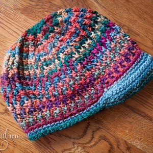 Mad Cap in Cables-Pattern to crochet this hat in multiple sizes.