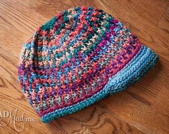 Mad Cap in Cables-Pattern to crochet this hat in multiple sizes.
