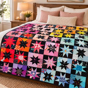 May include: A rectangular quilt featuring a grid of multi-colored star blocks. Each block contains a central star shape in various colors including pink, orange, yellow, blue, and purple, set against a black background with small white dots.