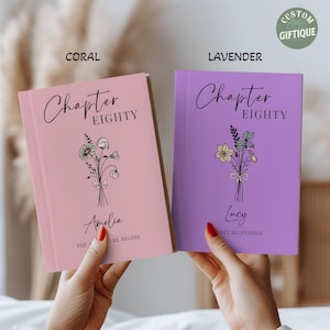 May include: Two hardcover journals, one coral and one lavender, each featuring the text Chapter EIGHTY, a floral line art illustration, and a name. The coral journal reads Amelia and THE ADVENTURE BEGINS, while the lavender journal reads Lucy and SWEET BEGINNINGS.
