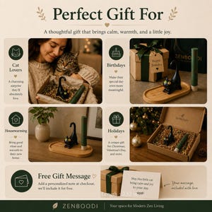 May include: A black cat-shaped incense holder with bright yellow eyes, paired with a cylindrical green incense stick and an oval bamboo tray. The set is displayed in various gift-ready arrangements, including a cardboard box with filler.