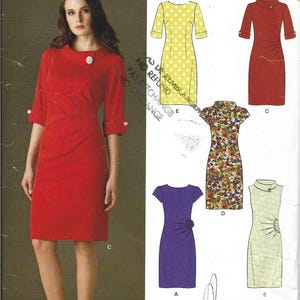 May include: A sewing pattern from New Look featuring several dress designs. The main image showcases a red dress with a unique collar and button detail. Additional dress styles include a yellow polka dot dress, a floral print dress, and a purple dress.