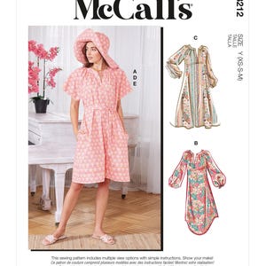 May include: McCall's sewing pattern M8212. The image shows a woman wearing a pink floral dress and matching hat. The pattern includes multiple view options. The size is Y (XS-S-M).