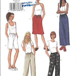 May include: A Butterick sewing pattern, number 3460, showing illustrations of women's clothing designs. The designs include a halter top with a red skirt, a white tank top with white shorts, and a white top with tan trousers.