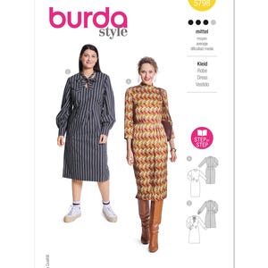 May include: A set of three ceramic mugs with a speckled, matte finish. The mugs are in shades of cream, light gray, and dark gray. Each mug has a simple, minimalist design and a rounded handle.