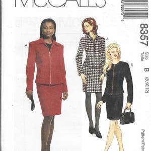 May include: McCall's sewing pattern 8357 for a two-piece suit featuring a jacket and skirt. The pattern displays three variations: a solid red jacket and skirt, a black and white houndstooth jacket and skirt, and a solid black jacket and skirt.