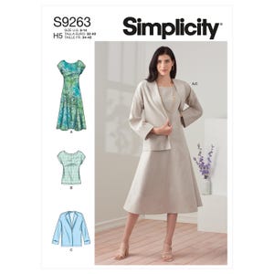 May include: Simplicity sewing pattern S9263 showing a woman in a beige dress and jacket. The pattern includes illustrations of a dress, top, and jacket. The pattern size is US 6-14, Euro 32-40.
