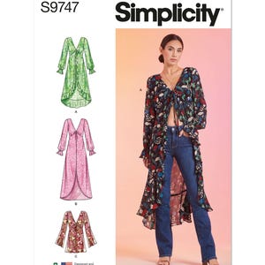 May include: Simplicity sewing pattern S9747 featuring a long-sleeved, V-neck duster with a front tie closure and ruffled hem. The pattern includes three variations: a green leaf print, a pink floral print, and a dark floral print worn over blue jeans.
