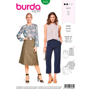 May include: A Burda Style sewing pattern featuring two women modeling blouses and pants. The pattern includes the text "BLUSE, BLOUSE, BLUSA" and size information. The image has a white background.