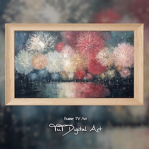 May include: A rectangular framed digital artwork featuring a vibrant display of fireworks in shades of red, pink, white, and blue, with reflections on a dark surface below. The frame is light-colored wood. Text reads Frame TV Art Tut Digital Art.