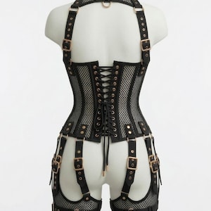 Black mesh corset top with structured bodysuit design, lace-up bustier style, gothic festival corset with adjustable straps and garter details, edgy rave and clubwear outfit for women