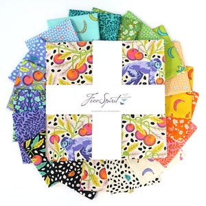 May include: A collection of colorful fabric squares arranged in a circular pattern. The fabrics feature various patterns, including monkeys, cherries, bananas, and floral designs. The text "Free Spirit" is visible in the center.