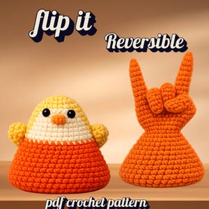May include: A reversible crochet pattern showing a yellow, white, and orange chick and an orange hand gesture. The text "flip it" and "Reversible" are above the objects, and "pdf crochet pattern" is below.