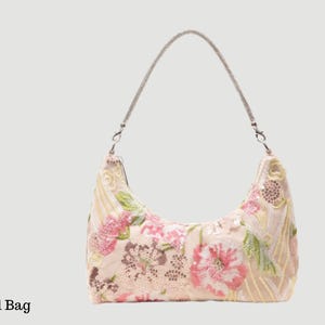 May include: A set of three ceramic mugs with a speckled, matte finish in blue, green, and white. Each mug has a simple, modern design, suitable for coffee or tea. The mugs are stacked on top of each other.