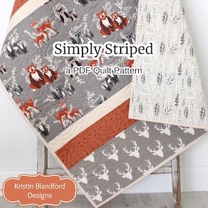 May include: A grey and orange quilt with a woodland animal print. The quilt is folded and leaning against a wooden ladder. The quilt is labelled "Simply Striped, a PDF Quilt Pattern".