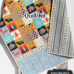 May include: A quilt kit featuring a colorful patchwork design with a variety of patterns and colors, including red, orange, yellow, green, blue, and black. The quilt kit includes fabric for the quilt top, backing, and binding. The quilt kit is labeled "Quilt Kit" and "Kristin Blandford Designs".