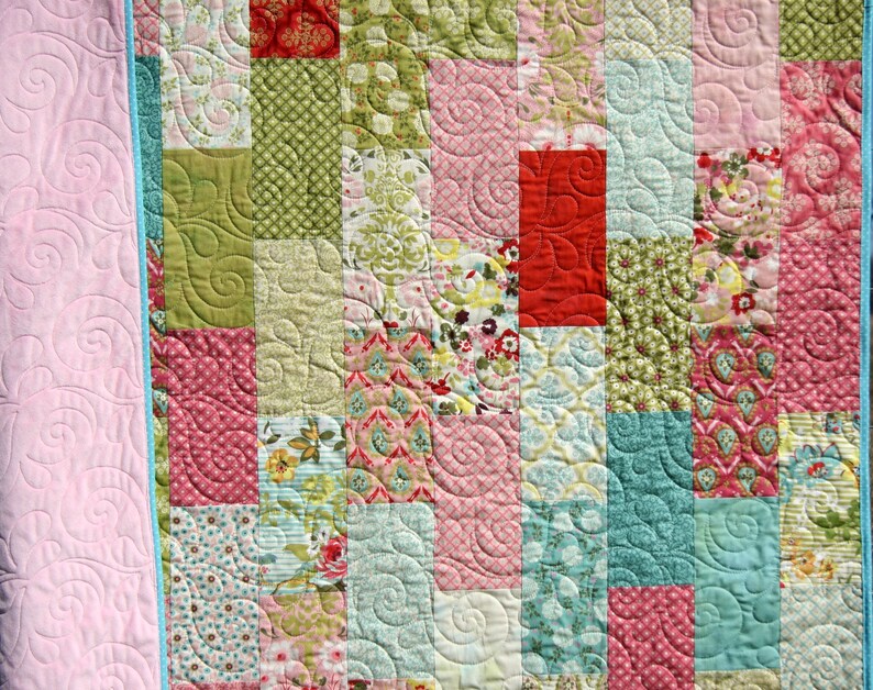 Easy baby quilt pattern PDF using 10 inch precut fabric squares and layer cakes for modern handmade nursery quilts and baby shower gifts