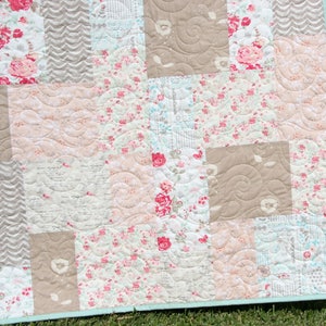 Contemporary mosaic-style quilt pattern designed for modern fabric collections and large-scale prints with detailed instructions for multiple quilt sizes