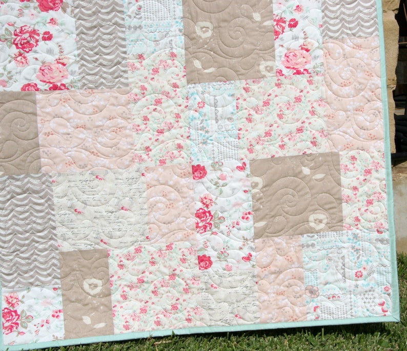 Contemporary mosaic-style quilt pattern designed for modern fabric collections and large-scale prints with detailed instructions for multiple quilt sizes