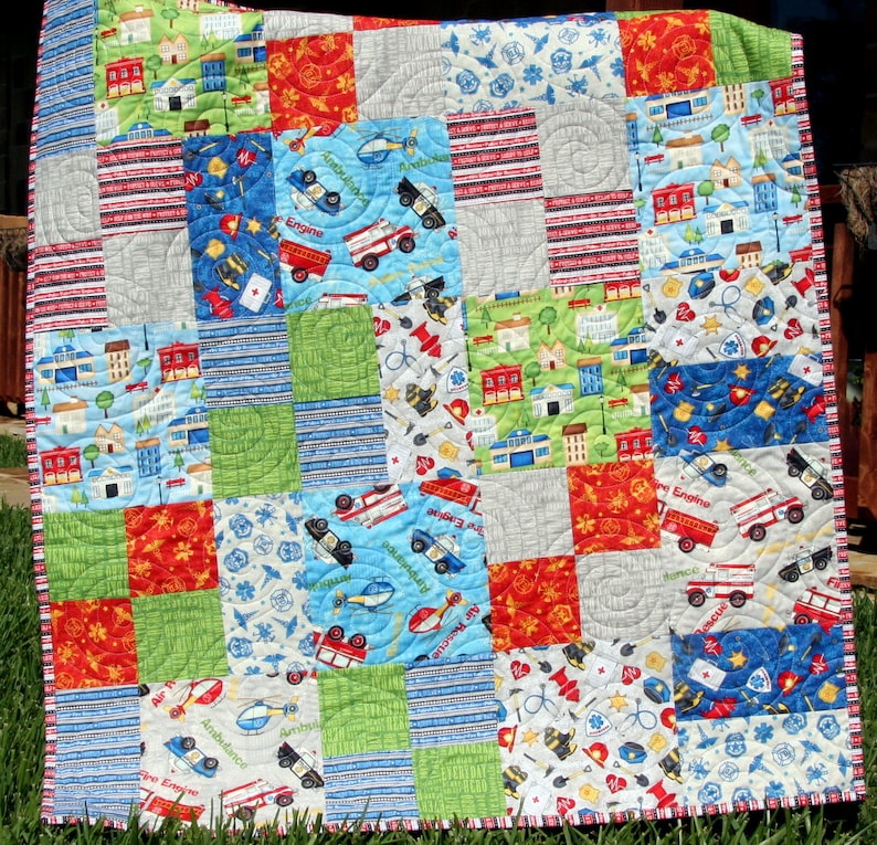 Bestselling beginner quilt pattern by Kristin Blandford Designs featuring an easy patchwork quilt design perfect for layer cakes, scrap busting, and modern quilting projects. The Whimsy Quilt Pattern is ideal for baby shower gifts, nursery decor, and handmade throw quilts.