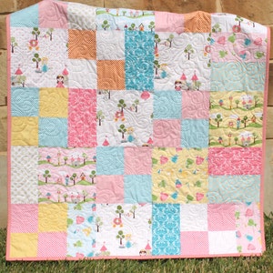 Easy PDF quilt pattern featuring a modern patchwork quilt layout with beginner friendly instructions and versatile sizing for baby quilts and throw quilts. The Whimsy Quilt Pattern by Kristin Blandford Designs works beautifully with layer cakes and coordinated fabric collections.