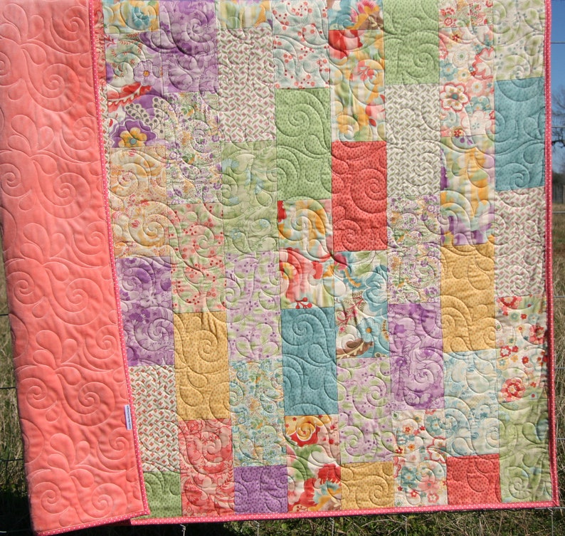 Beginner quilt sewing pattern with easy-to-follow patchwork construction designed for precut fabric quilting and fast sewing projects
