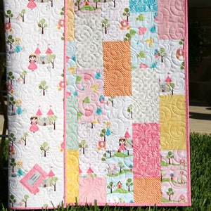 Layer cake quilt pattern PDF for modern baby quilts and throw quilts featuring a clean path-inspired quilt layout and beginner-friendly piecing