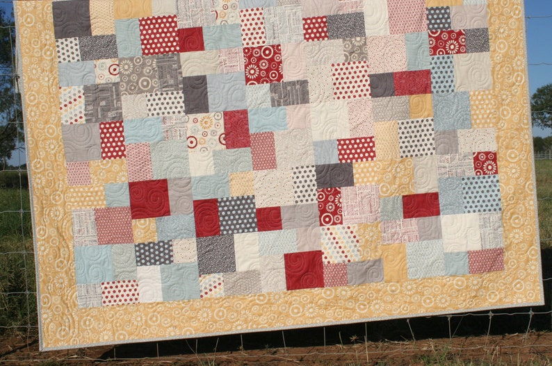 Beginner-friendly PDF quilt pattern with modern vintage patchwork styling and easy layer cake quilt construction for throw and baby quilts