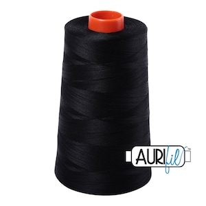 May include: A spool of black thread with an orange plastic top. The spool is labelled "AURIfil™".