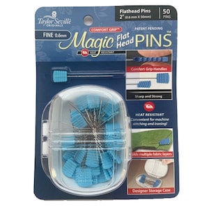 May include: A package of 50 heat-resistant, 2-inch flat head sewing pins with comfort grip handles. The pins are in a clear plastic case with a blue and white label that reads "Magic Flat Head Pins".