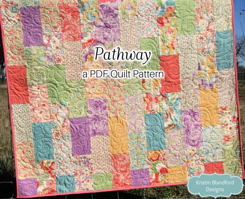Beginner-friendly layer cake quilt pattern showcasing vertical patchwork blocks in soft pastel floral fabrics with decorative quilting texture and modern handmade quilt design.