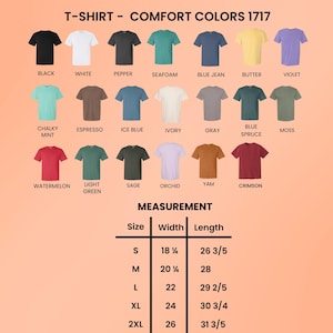 May include: A product display featuring Comfort Colors 1717 t-shirts in various colours, including black, white, and violet. Measurements are provided for sizes S to 2XL, with widths ranging from 46.36 cm to 66.04 cm and lengths from 67.63 cm to 80.96 cm.