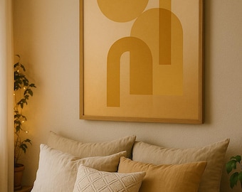May include: A framed abstract art print with geometric shapes in shades of yellow and beige hangs above a bed with neutral-toned bedding and pillows. The room has a warm, inviting atmosphere.