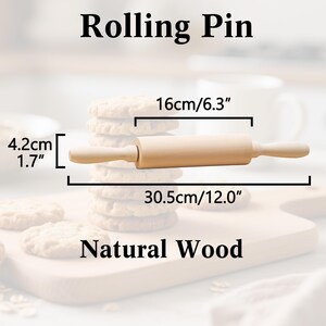May include: A natural wood rolling pin, 30.5cm long, 16cm wide, and 4.2cm in diameter. The text "Rolling Pin" and "Natural Wood" are displayed. The rolling pin is shown with a stack of cookies.