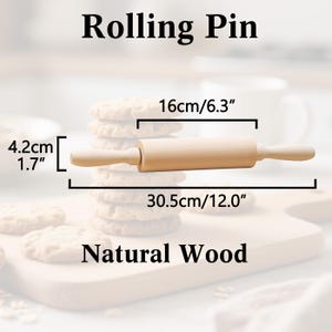 May include: A natural wood rolling pin, 12.0 inches long, 6.3 inches wide, and 1.7 inches in diameter. The text "Rolling Pin" and "Natural Wood" are displayed. The rolling pin is shown with a stack of cookies.
