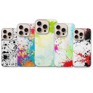 May include: Five phone cases with colorful abstract paint splatter designs. The cases feature a variety of colors, including black, white, red, pink, blue, green, and yellow. The cases are designed to fit a smartphone.