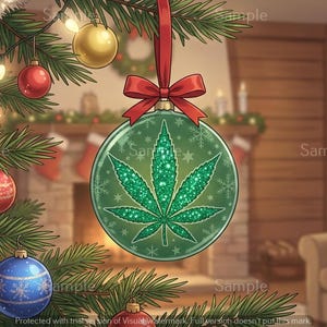 May include: A round green Christmas ornament featuring a glittery green cannabis leaf design in the center. The ornament is topped with a gold cap and a red ribbon bow. It hangs from a pine tree branch decorated with gold, red, and blue ornaments.