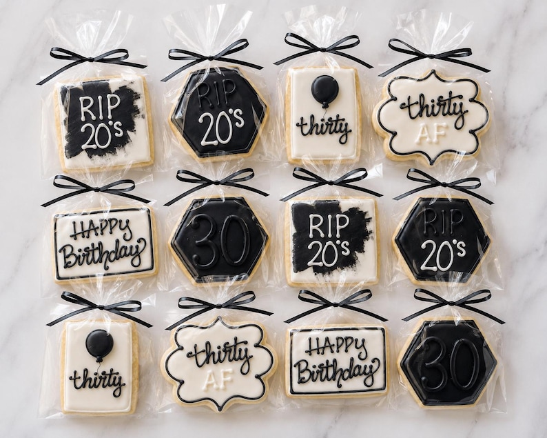 May include: Twelve individually wrapped sugar cookies decorated with black and white icing. Designs include text reading RIP 20's, thirty AF, Happy Birthday, and the number 30, along with balloon illustrations. Each cookie is tied with a black ribbon.