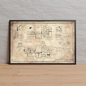 May include: Framed architectural blueprint of a mansion, featuring detailed floor plans for multiple levels. The vintage-style print includes handwritten notes, labels, and the word "CONFIDENTIAL" stamped on the bottom right corner. The blueprint is in a black frame.