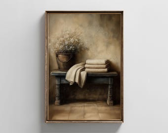 May include: A framed painting depicts a still life scene. A rustic wooden bench holds folded towels and a draped cloth. A metal bucket with flowers sits atop the bench. The color palette is muted with beige, brown, and blue tones.