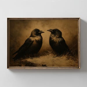 May include: A framed sepia-toned print featuring two crows facing each other. The birds are depicted in dark shades, with detailed feathers and beaks. The artwork is set against a blurred background, creating a vintage aesthetic.