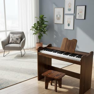 May include: A dark wood piano with a matching stool sits in a well-lit room. The piano has black and white keys and a music stand. A gray armchair with a geometric pillow and a potted plant are also in the room. Artwork hangs on the blue wall.
