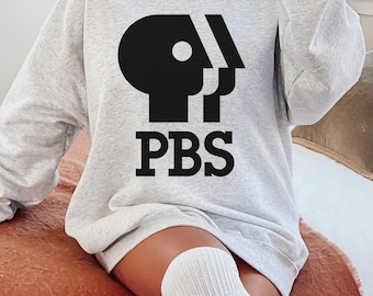T-shirt avec logo PBS Protect, chemise rétro du service de radiodiffusion publique, sweat-shirt nostalgie des années 70, cadeau classique pour les fans de télévision, t-shirt de protestation politique