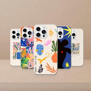 May include: Five phone cases with vibrant abstract designs. The cases display diverse patterns, including floral motifs, geometric shapes, and Matisse-inspired art. The text "HENRI MATISSE" is visible on one case.