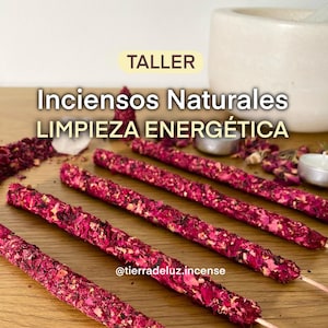 May include: Close-up of several incense sticks covered in dried red flower petals. The sticks are arranged on a wooden surface. Text in Spanish reads "Incensos Naturales LIMPIEZA ENERGÉTICA" and "TALLER".