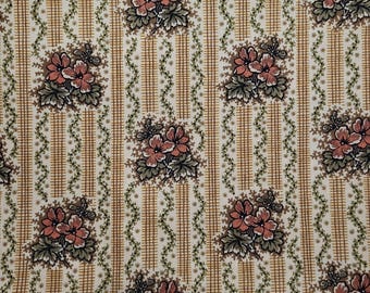 May include: A white fabric with a repeating pattern of brown and green vines and pink flowers. The fabric has a subtle grid pattern.