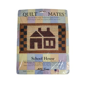 May include: A package for a "School House" rug hooking kit. The kit includes a 3.75 inch canvas, locker hook, cotton twine, and easy to follow instructions. The finished size of the rug is approximately 21 inches by 28 inches. The rug features a brown and tan house with a black and tan checkered border.