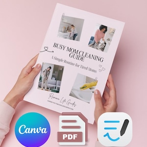 Könnte beinhalten: Ein rosa Ratgeber mit dem Titel "Busy Mom Cleaning Guide" mit Bildern von Reinigungsaufgaben. Der Ratgeber wird von Händen vor einem rosa Hintergrund gehalten. Enthält Canva-, PDF- und Notizsymbole.