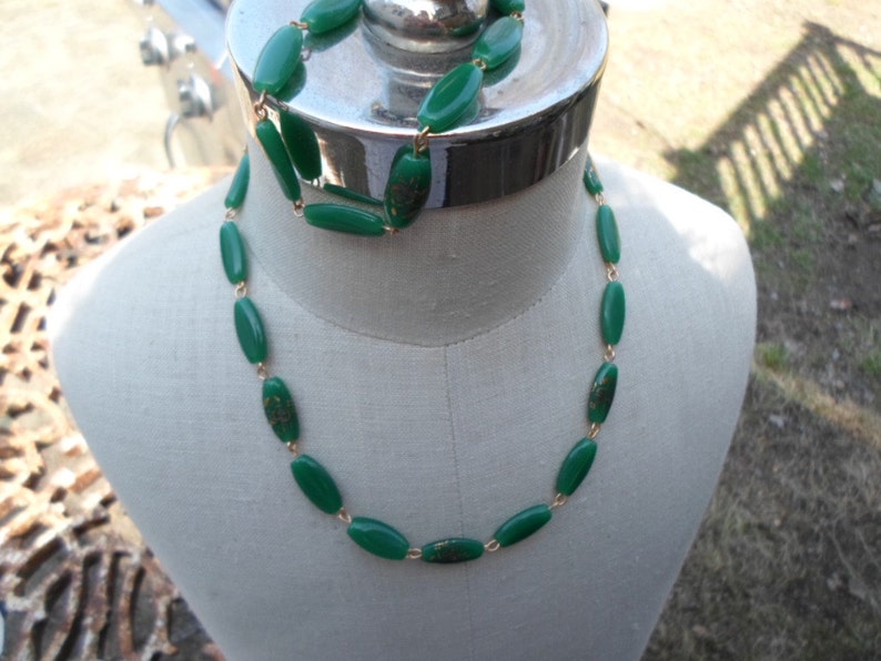 Vintage 1960s to 1970s Green Glass Gold Tone Necklace and Bracelet Set Floral Motif